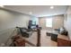 Cozy sitting room with carpet, comfortable leather furniture, and a TV at 548 Gosford Ct, Westfield, IN 46074