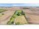 An aerial view of a home surrounded by farmland on a sunny day at 5480 E County Rd 800 N, Brownsburg, IN 46112