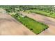 Aerial view of a large grassy lot surrounded by farmland on a sunny day at 5480 E County Rd 800 N, Brownsburg, IN 46112