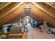 Spacious attic featuring exposed wood beams, providing ample storage space at 5480 E County Rd 800 N, Brownsburg, IN 46112