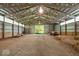 Open barn interior with high ceilings, natural light, and ample storage space at 5480 E County Rd 800 N, Brownsburg, IN 46112