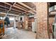 Unfinished basement with exposed brick walls and utilities providing potential for customization at 5480 E County Rd 800 N, Brownsburg, IN 46112