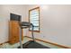 This exercise room has a treadmill, natural light and storage providing an ideal fitness space at 5480 E County Rd 800 N, Brownsburg, IN 46112