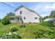 Charming two-story home with a covered porch and well-maintained lawn and garden area at 5480 E County Rd 800 N, Brownsburg, IN 46112
