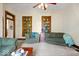 Comfortable living room with carpet, armchairs, and built-in bookshelves at 5480 E County Rd 800 N, Brownsburg, IN 46112