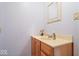 This powder room boasts a modern sink and vanity, set against a neutral wall, creating a minimalist aesthetic at 5480 E County Rd 800 N, Brownsburg, IN 46112