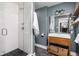 Updated bathroom with modern vanity, glass enclosed tile shower, and stylish decor at 609 E 39Th St, Indianapolis, IN 46205