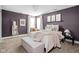 Cozy bedroom with plush carpet, soft lighting, and modern decor at 609 E 39Th St, Indianapolis, IN 46205
