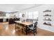 Bright dining room with a large window, hardwood floors, and modern decor at 609 E 39Th St, Indianapolis, IN 46205