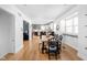 Open-concept dining room features hardwood floors with seamless connection to kitchen, perfect for entertaining at 609 E 39Th St, Indianapolis, IN 46205