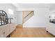 Welcoming entryway with hardwood floors, decorative furniture, and natural light at 609 E 39Th St, Indianapolis, IN 46205