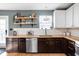 Charming kitchen offers butcher block counters, stainless steel appliances and modern cabinets at 609 E 39Th St, Indianapolis, IN 46205