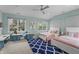 Shared ' bedroom, featuring two beds, stylish decor, and functional workspaces at 654 N Senate Ave, Indianapolis, IN 46202