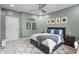 Spacious bedroom features a bed, neutral walls, and a cozy decorative rug at 654 N Senate Ave, Indianapolis, IN 46202