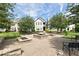 Inviting community area with a central fountain, benches, and well-maintained landscaping at 654 N Senate Ave, Indianapolis, IN 46202