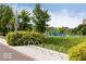 A scenic culture trail with lush green lawns, modern bike racks, and mature trees at 654 N Senate Ave, Indianapolis, IN 46202