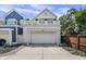 Charming two-story home with a spacious garage and a lovely balcony, perfect for enjoying the outdoors at 654 N Senate Ave, Indianapolis, IN 46202