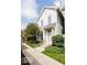 Charming two-story home with well-manicured landscaping, inviting entrance, and plenty of natural light at 654 N Senate Ave, Indianapolis, IN 46202