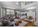 Spacious living room seamlessly connecting to a modern kitchen, perfect for entertaining and Gathering gatherings at 654 N Senate Ave, Indianapolis, IN 46202