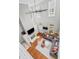 A bird's eye view of a living area with fireplace and large windows, and soaring ceilings at 654 N Senate Ave, Indianapolis, IN 46202