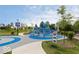 Enjoy the outdoors at the community playground with modern play equipment and mature trees at 654 N Senate Ave, Indianapolis, IN 46202