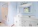 Bright bathroom featuring double sinks, a large mirror, and a shower/tub combination with tile surround at 659 Carson Ct, Carmel, IN 46033