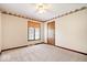 Inviting bedroom features carpet, ceiling fan, neutral walls, and natural light from the window at 659 Carson Ct, Carmel, IN 46033