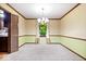 Dining room is bathed in natural light and features modern chandelier at 659 Carson Ct, Carmel, IN 46033