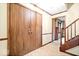 Inviting entryway with tile floor, large closet, and staircase leading to the upper level at 659 Carson Ct, Carmel, IN 46033