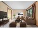 Well-lit living room featuring neutral tones and ample seating at 659 Carson Ct, Carmel, IN 46033