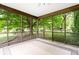 Cozy screened porch with an outdoor view at 659 Carson Ct, Carmel, IN 46033