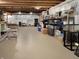 Unfinished basement with open beams and ample storage at 6693 W May Apple Dr, McCordsville, IN 46055