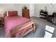Bedroom with a comfortable bed, wooden furniture, and a cozy atmosphere at 6693 W May Apple Dr, McCordsville, IN 46055