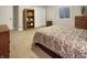 Bedroom with a large bed, bookcase, chest of drawers and small window for natural light at 6693 W May Apple Dr, McCordsville, IN 46055