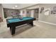 Recreation room featuring a pool table, ping pong table, and sports memorabilia wall decor at 6693 W May Apple Dr, McCordsville, IN 46055