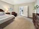Spacious main bedroom with a private bathroom and a comfortable sitting area at 6693 W May Apple Dr, McCordsville, IN 46055