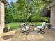 Cozy outdoor patio with fire pit and comfortable seating for relaxing at 6693 W May Apple Dr, McCordsville, IN 46055