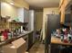 A functional kitchen offers stainless steel appliances and ample counter space for easy meal preparation at 670 Van Ave, Shelbyville, IN 46176