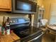 A well-equipped kitchen includes modern appliances and ample storage space at 670 Van Ave, Shelbyville, IN 46176