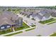 An aerial view of the neighborhood and well-kept exteriors at 7077 Antiquity Dr, Carmel, IN 46033