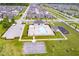 Community pool area with lounge chairs, playground, and parking in a well-maintained green neighborhood at 7077 Antiquity Dr, Carmel, IN 46033