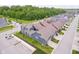 Two-story home featuring a well-maintained lawn, driveway, and attractive curb appeal in a suburban neighborhood at 7077 Antiquity Dr, Carmel, IN 46033