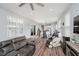 Open-concept living space with a modern kitchen and dining area, perfect for entertaining guests at 7077 Antiquity Dr, Carmel, IN 46033