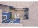 Aerial shot of an outdoor patio with seating, decorative stones, and surrounded by sections of the roof at 7077 Antiquity Dr, Carmel, IN 46033