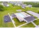 Aerial view of a community pool, playground, lounge chairs and recreational amenities in a residential area at 7077 Antiquity Dr, Carmel, IN 46033