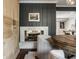 Elegant fireplace with marble surround, seamlessly connecting the dining area to the living room at 7575 Central Ave, Indianapolis, IN 46240
