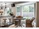 Kitchen and breakfast nook with views to fenced-in yard at 7575 Central Ave, Indianapolis, IN 46240