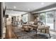 Spacious living room seamlessly connected to a modern kitchen, ideal for entertaining and Gathering gatherings at 7575 Central Ave, Indianapolis, IN 46240