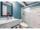 Modern bathroom has white vanity and sleek shower with glass enclosure, and a bidet seat at 7824 Hedgehop Dr, Zionsville, IN 46077