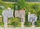 An aerial view shows houses with beautiful lawns and landscaping at 7970 Cobblesprings Dr, Avon, IN 46123